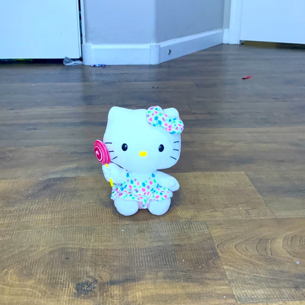 polkadot dress and bow comes with lollipop in hand year 2012